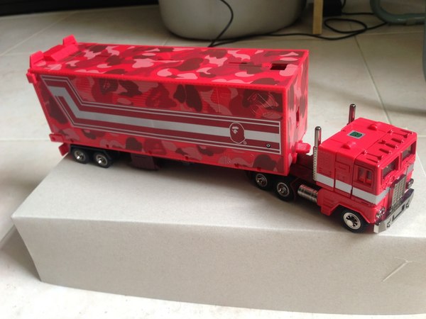 BAPE Red Cammo Convoy Exclusive Optimus Prime Figure Out The Box Image  (40 of 41)